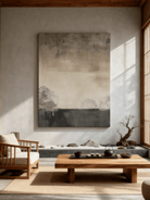The camera captured the effect of the wabi-sabi style abstract painting in the living room.