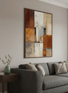 Close-up of 3D heavy textured abstract oil painting in burnt orange, ochre, and grey by Seraphina Rose for modern living room decor.