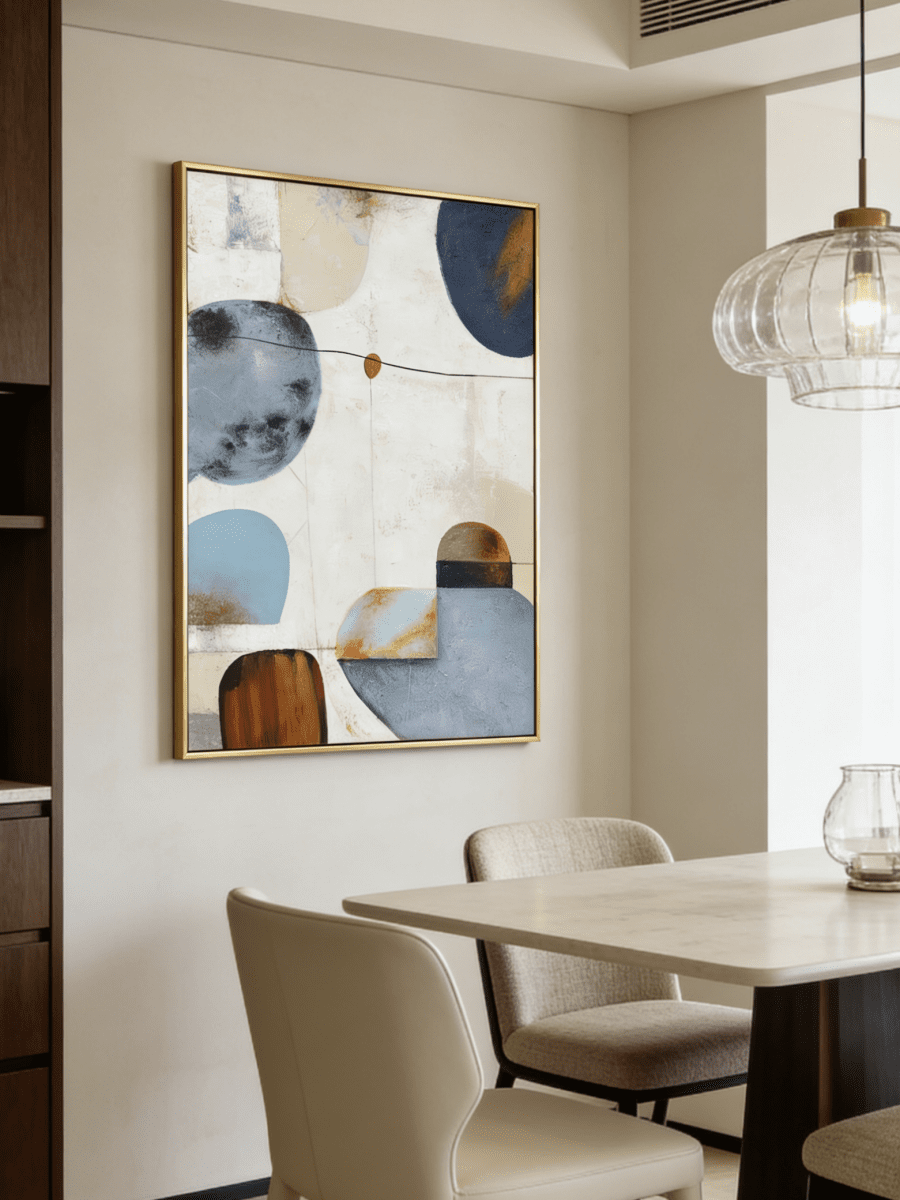 Hand-painted modern organic abstract painting featuring blue and brown geometric shapes with thick texture in a gold floater frame.