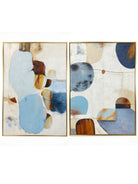 Large 2-piece hand-painted abstract diptych with organic blue and terracotta shapes and heavy texture by Seraphina Rose in a modern coastal living room.