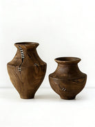 hand-carved Wabi-Sabi natural wood vase with metallic stitch accents, primitive rustic wooden sculpture for minimalist console decor.