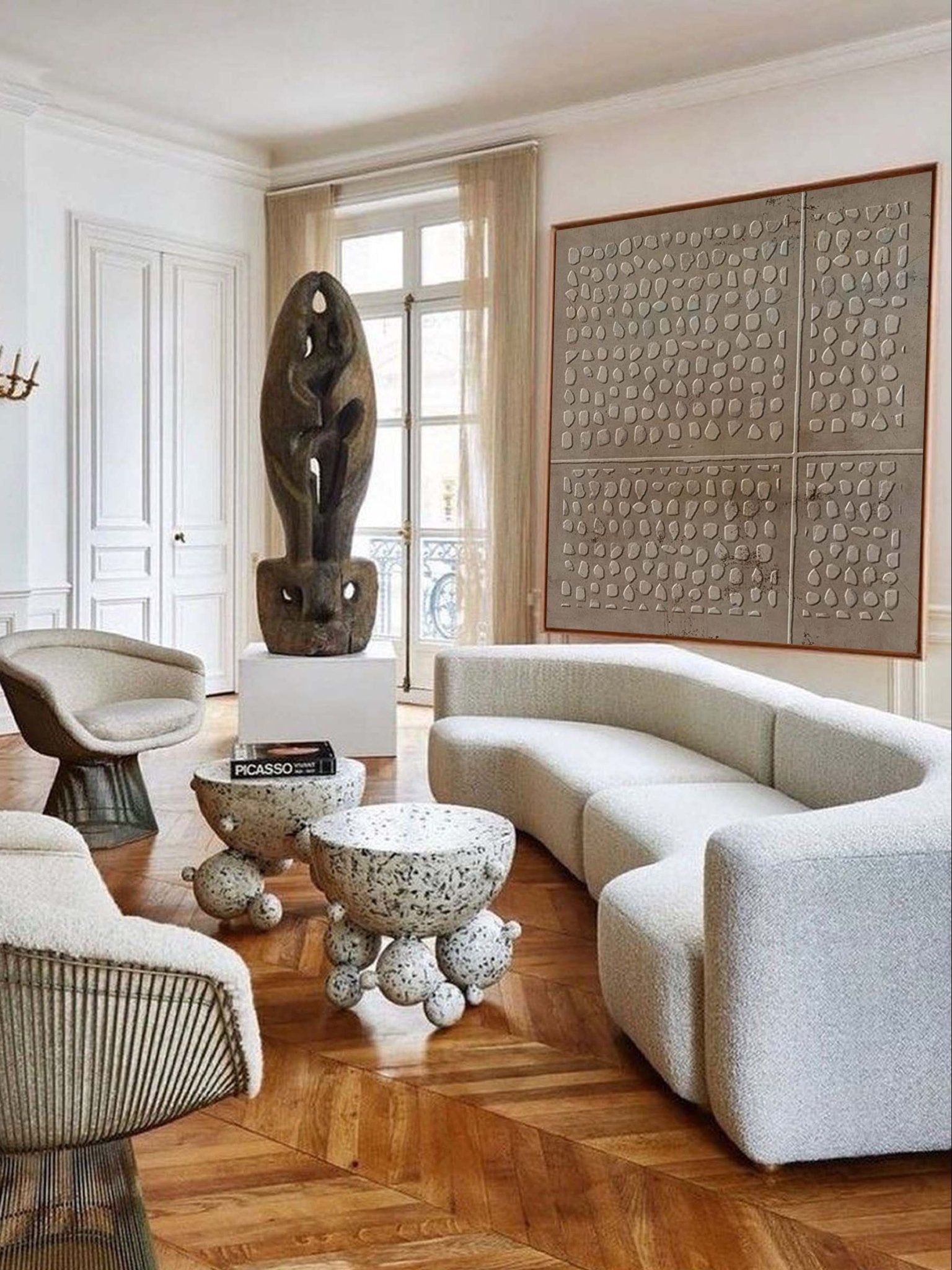 Wabi-Sabi textured circle wall art displayed in a modern living room, showcasing minimalist home decor