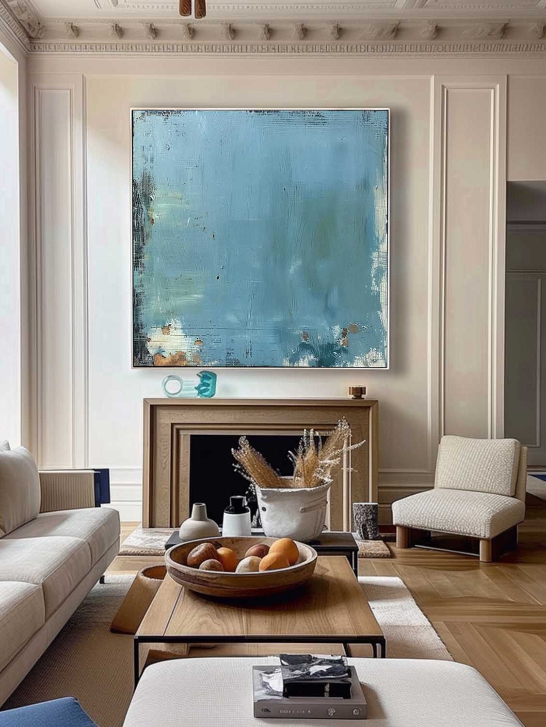 Large blue distressed textured abstract oil painting hand-painted on canvas by Akari Kobayashi, with a floating gold frame on a white background. Perfect for a living room wall.